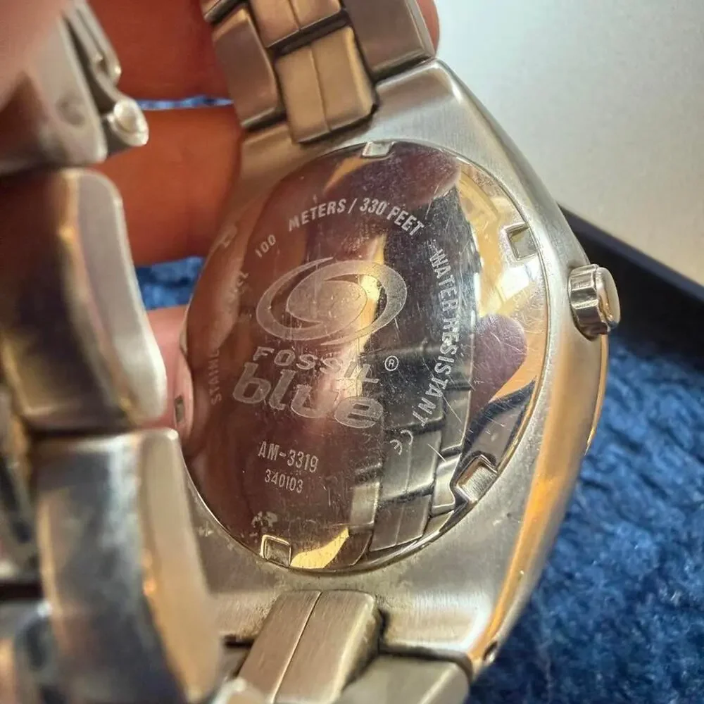 Fossil blue dial watch with silver band